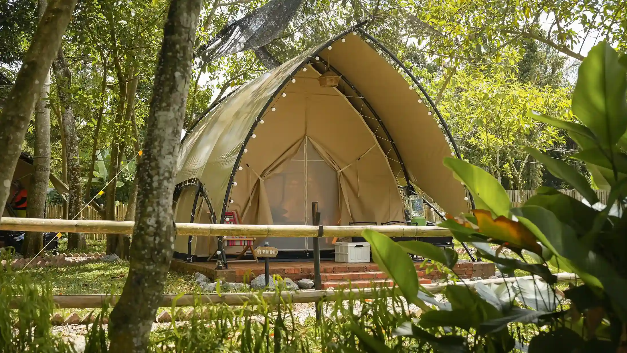 The Nest glamping tent in nature at Suka Camping